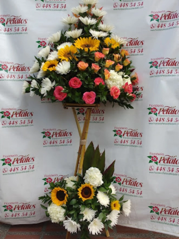 flores-floristeria-medellin-rf-12-la-muerte-se-ha-llevado-su-cuerpo-pero-su-espiritu-siempre-estara-con-nosotros-por-siempre-en-nuestros-corazones-flores-floristeria-medellin